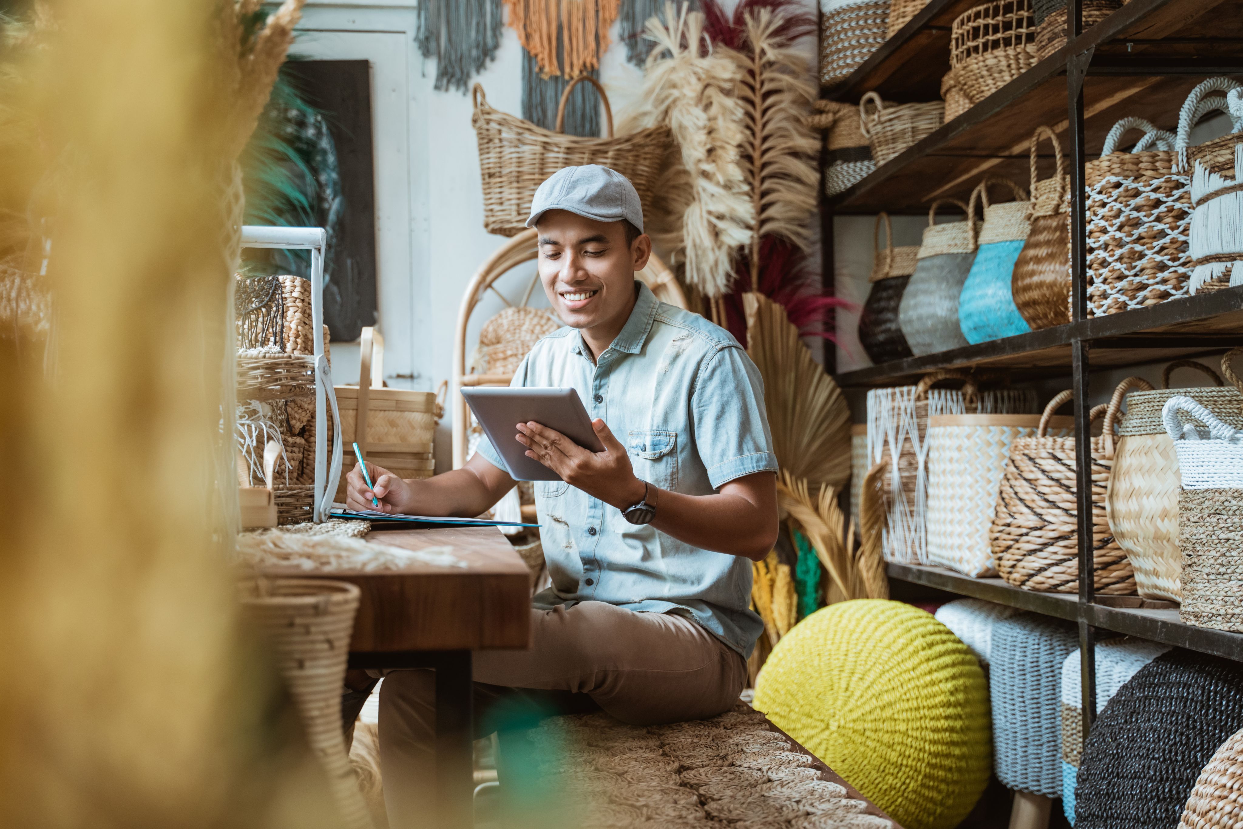 man holding white ceramic teacup